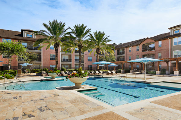 Pool with Sundeck at Camden Royal Oaks Apartments in Houston Texas