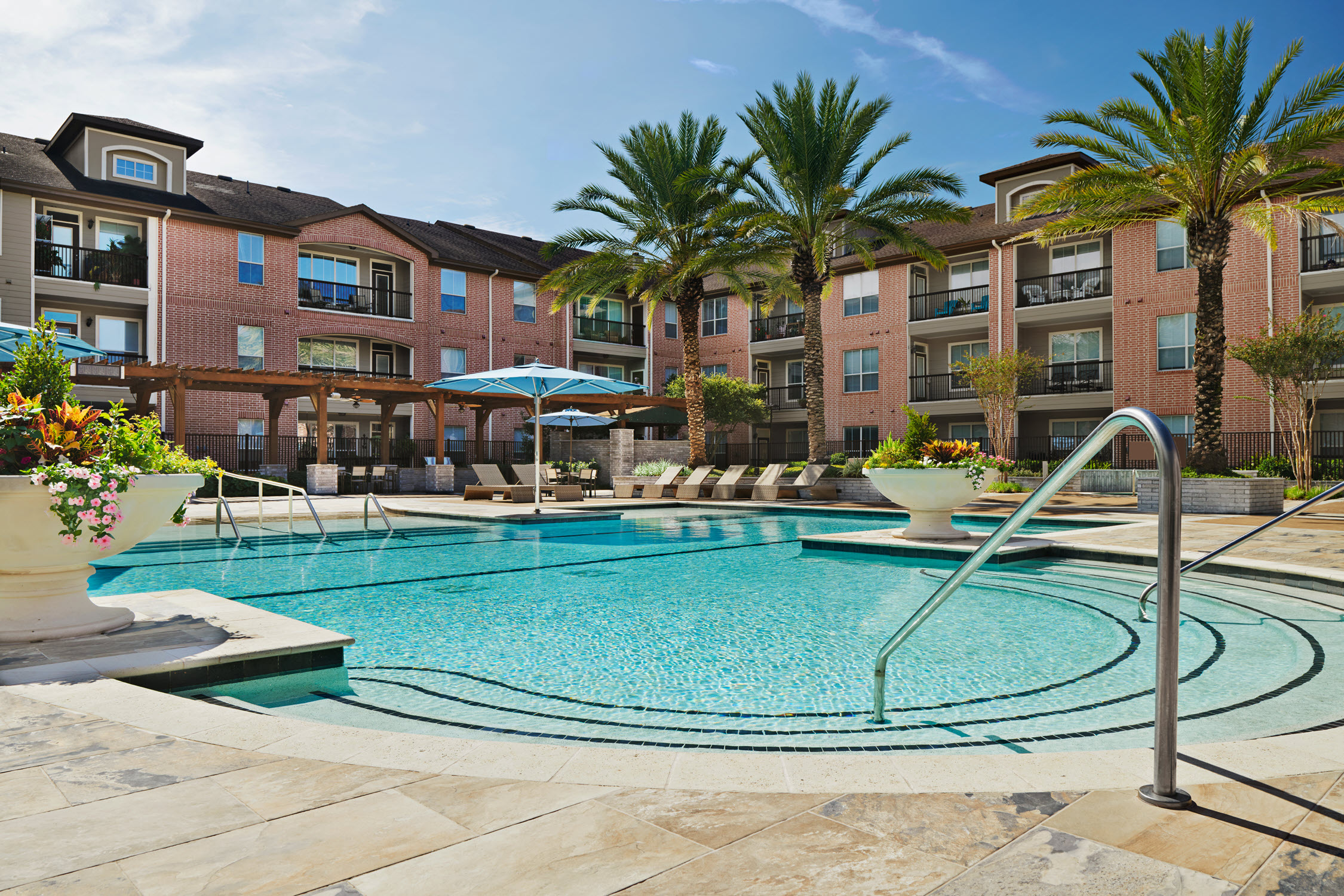 Pool with Sundeck at Camden Royal Oaks Apartments in Houston Texas